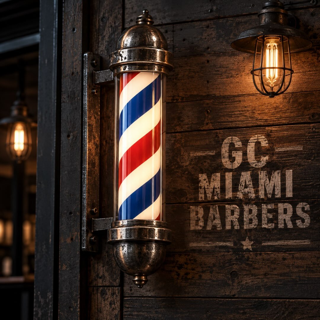 GC Miami Barbers storefront sign with a classic barber pole