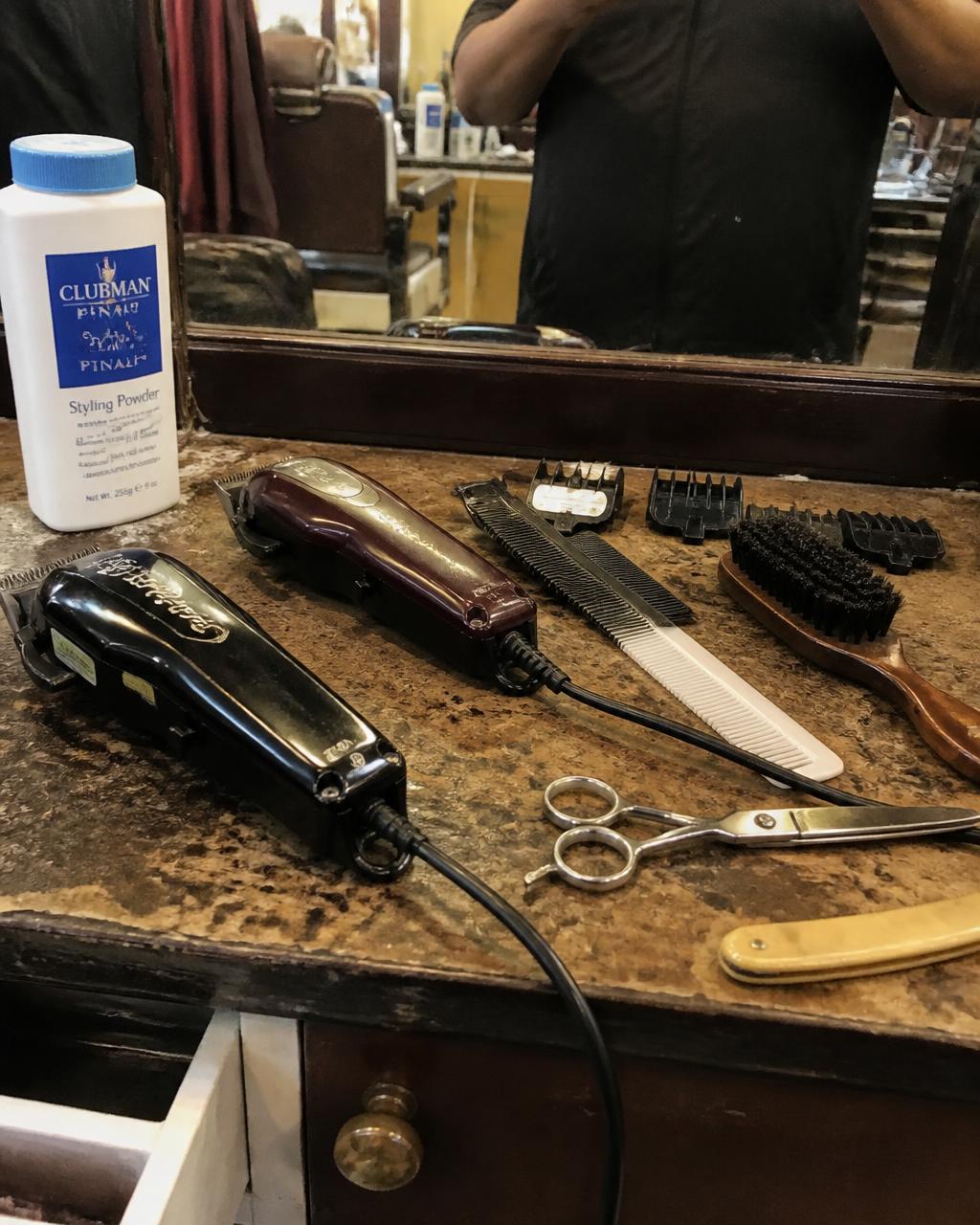 Clippers, combs and shears on the barber station at GC Miami Barbers