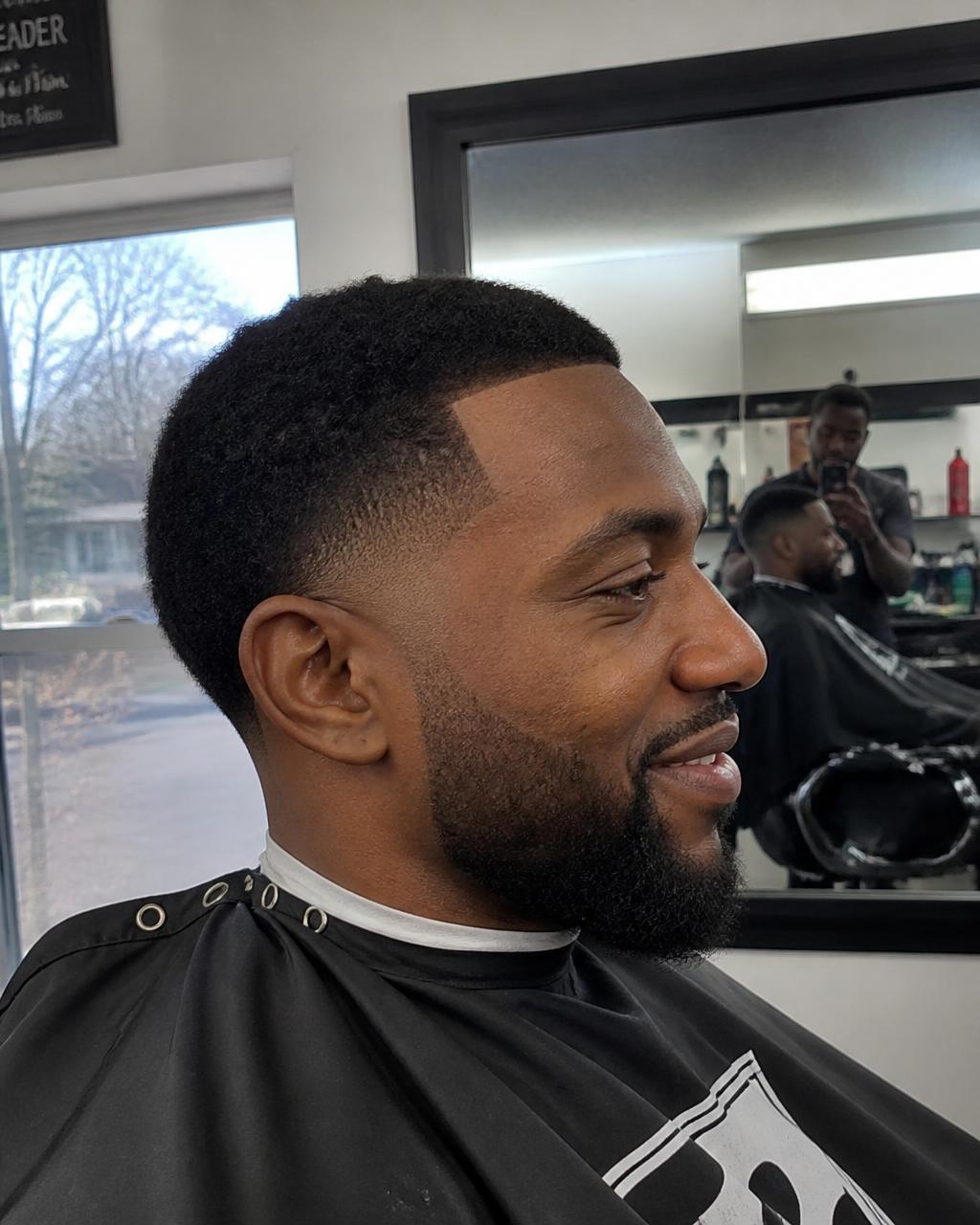 Sharp taper fade with a crisp line-up at GC Miami Barbers